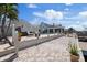A backyard featuring a pool, hot tub, patio and lovely waterfront view at 5033 Cabrilla Ct, New Port Richey, FL 34652