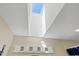 Bright bathroom featuring a skylight for natural light and a modern shower at 5033 Cabrilla Ct, New Port Richey, FL 34652