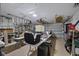 Spacious garage featuring ample storage, work tables, and an organized layout, perfect for projects and hobbies at 5033 Cabrilla Ct, New Port Richey, FL 34652