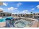 A backyard featuring a pool, hot tub and lovely waterfront view at 5033 Cabrilla Ct, New Port Richey, FL 34652