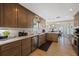 Renovated kitchen with granite countertops, stainless steel appliances, and plenty of cabinet space at 5033 Cabrilla Ct, New Port Richey, FL 34652