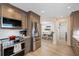 The kitchen is equipped with stainless steel appliances and wood cabinets at 5033 Cabrilla Ct, New Port Richey, FL 34652