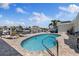 Backyard pool, patio, lounge chairs and beautiful water views enhance the outdoor living experience at 5033 Cabrilla Ct, New Port Richey, FL 34652