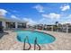 Backyard pool featuring comfortable lounge chairs, stunning waterfront views, and serene atmosphere at 5033 Cabrilla Ct, New Port Richey, FL 34652