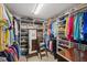 Large walk-in closet with extensive shelving and ample storage space for clothes and accessories at 5033 Cabrilla Ct, New Port Richey, FL 34652