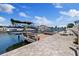 Waterfront property with a private boat dock and lift, offering convenient access to waterways and scenic views at 5033 Cabrilla Ct, New Port Richey, FL 34652