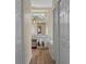 Bathroom with bathtub, vanity and walk through hall to another room at 5110 Championship Cup Ln, Spring Hill, FL 34609