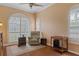 This office features an arched window, and shuttered windows for natural light, and a cozy reading chair at 5110 Championship Cup Ln, Spring Hill, FL 34609
