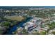 Waterfront condo building features a community pool, boat dock, and nearby neighborhood amenities at 5640 Ferguson Ct # 2106, New Port Richey, FL 34652