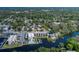 Waterfront condo building with boat dock and community pool on a canal in a neighborhood at 5640 Ferguson Ct # 2106, New Port Richey, FL 34652