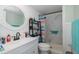 Bathroom featuring shower with tasteful decor, offering a relaxing space at 5640 Ferguson Ct # 2106, New Port Richey, FL 34652
