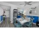 Charming dining area with seating for four, complemented by stylish accents and bright, natural light at 5640 Ferguson Ct # 2106, New Port Richey, FL 34652