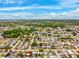 An expansive aerial view showcases the surrounding neighborhood, providing insight into nearby amenities at 5706 Mockingbird Dr, New Port Richey, FL 34652