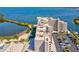 Luxury waterfront condominium featuring a parking lot, and beach access at 6035 Sea Ranch Dr # 209, Hudson, FL 34667