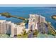 Stunning condominium building with water views, parking, and manicured landscaping at 6035 Sea Ranch Dr # 209, Hudson, FL 34667