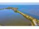 Aerial view showcases the waterfront location of this residence at 6035 Sea Ranch Dr # 209, Hudson, FL 34667