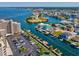 Stunning aerial view of waterfront community with boat docks and canal access to the open bay at 6035 Sea Ranch Dr # 209, Hudson, FL 34667