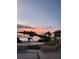 Beautiful bay view with serene water, palm trees, and manicured landscaping at 6035 Sea Ranch Dr # 209, Hudson, FL 34667