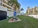 This property has picnic tables and BBQ grills on the beautiful lush green lawn for relaxing and enjoying the outdoors at 6035 Sea Ranch Dr # 209, Hudson, FL 34667