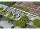 Wide aerial view of the community highlighting well-maintained homes and green spaces with mature trees at 6047 Elmhurst Dr # 5A, New Port Richey, FL 34653