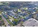 Wide aerial view of the community showcasing the residential layout and parking areas at 6047 Elmhurst Dr # 5A, New Port Richey, FL 34653