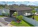 Exterior shot of community covered bridge surrounded by a green landscape at 6047 Elmhurst Dr # 5A, New Port Richey, FL 34653