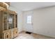 Inviting entryway with a decorative cabinet, hardwood flooring, and bright front door at 6047 Elmhurst Dr # 5A, New Port Richey, FL 34653