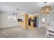 Open-concept kitchen with modern appliances and adjacent dining area at 6047 Elmhurst Dr # 5A, New Port Richey, FL 34653