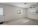 Inviting living room with natural light offers comfortable space for relaxation at 6047 Elmhurst Dr # 5A, New Port Richey, FL 34653
