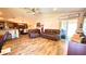 Inviting living area with comfortable seating and easy access to the kitchen and outdoor spaces at 6054 Merrifield Dr, Zephyrhills, FL 33541