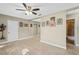 The updated living room has neutral walls and floors at 6104 Cork Ct, New Port Richey, FL 34653