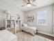 Bright bedroom with a ceiling fan and window and plenty of storage space at 6229 Sea Air Dr, Apollo Beach, FL 33572