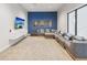 Community room with TV, comfortable seating, and movie poster decor for entertaining guests at 6229 Sea Air Dr, Apollo Beach, FL 33572