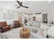 Inviting living room seamlessly connects to the kitchen, featuring comfortable seating and stylish decor at 6229 Sea Air Dr, Apollo Beach, FL 33572