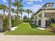 Community recreation area offers a lawn game, landscaping, and covered seating for neighborhood residents at 6229 Sea Air Dr, Apollo Beach, FL 33572