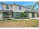 Charming two-story home with a two car garage and nicely landscaped front yard at 6246 Arthur Ave, New Port Richey, FL 34653