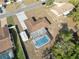 Aerial view of home showcasing a private pool area and a well-maintained roof at 6340 Hillview Rd, Spring Hill, FL 34606