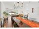 Inviting dining room adjacent to the living area with sliding glass doors leading to a private outdoor space at 635 Painted Leaf Dr, Brooksville, FL 34604