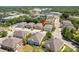 Aerial view of townhomes in a community, conveniently located near shopping centers at 7500 Red Mill Cir, New Port Richey, FL 34653