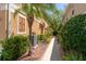 Exterior view of property showing decorative shutters, palm tree and landscaping at 7500 Red Mill Cir, New Port Richey, FL 34653
