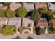 Aerial view of home showcasing the neighborhood, landscaping, and circular driveway at 8505 Lincolnshire Dr, Hudson, FL 34667