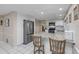 Eat-in kitchen features stainless steel appliances and granite countertops at 8505 Lincolnshire Dr, Hudson, FL 34667