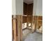 Bathroom with wooden framing, tile floor and existing plumbing, perfect for renovation at 8711 Cutlass Dr, Hudson, FL 34667