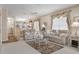 Cozy living room featuring a neutral color palette and ceiling fan at 9147 Rhett Ln, Weeki Wachee, FL 34613