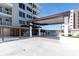 Building exterior featuring a covered entrance, providing convenient access and stylish design at 920 N Osceola Ave # 203, Clearwater, FL 33755