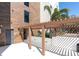 Exterior shot of building featuring a covered walkway and modern architectural design at 920 N Osceola Ave # 203, Clearwater, FL 33755