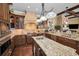 Gourmet kitchen features a large island with a sink and stainless steel appliances at 10019 Milano Dr, Trinity, FL 34655