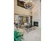 Bright living room with fireplace, large windows, and view of the pool at 10019 Milano Dr, Trinity, FL 34655