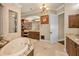 Luxurious main bathroom featuring a soaking tub, granite countertops, and vanity area at 10019 Milano Dr, Trinity, FL 34655