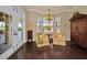 Comfortable sitting area with bay windows, perfect for relaxing and enjoying the view at 10019 Milano Dr, Trinity, FL 34655